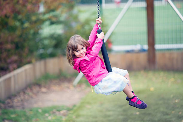 istock Little girl playing in the zip 519550185