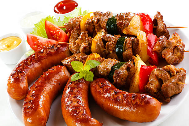 istock Grilled meat and sausages 519550565