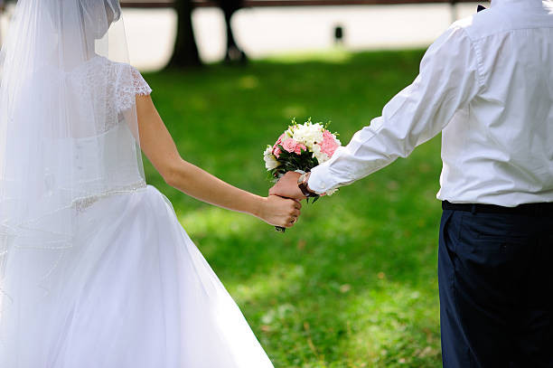 istock Happy bride and groom on their wedding 519551028
