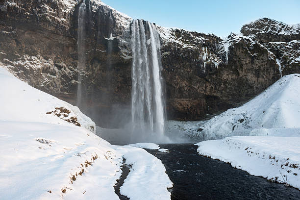 istock Sunset at Seljalandfoss waterfall at winter, Iceland 519551134