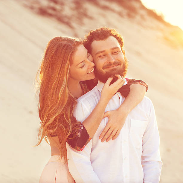 istock Young couple in love walking autumn park 519553054