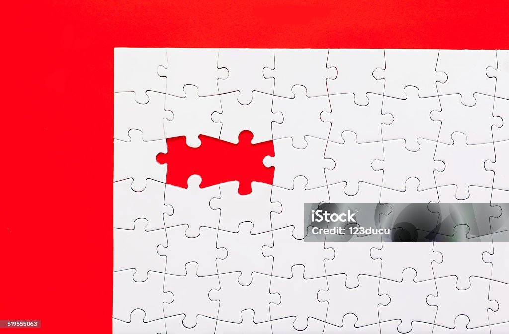 Jigsaw Puzzle Jigsaw puzzle on red background Puzzle Stock Photo