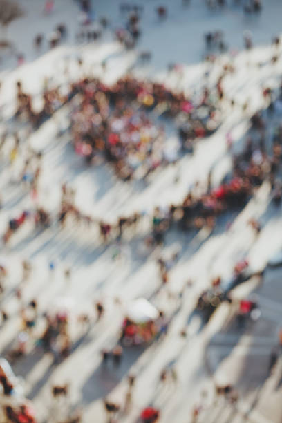 istock Blurred crowd of people 519555360