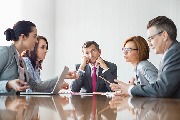 istock Businesspeople arguing in meeting 519555365