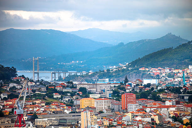 City view. Vigo, Spain. Aerial view to Vigo town-centre and commercial port, river and mountains in background. vigo stock pictures, royalty-free photos & images