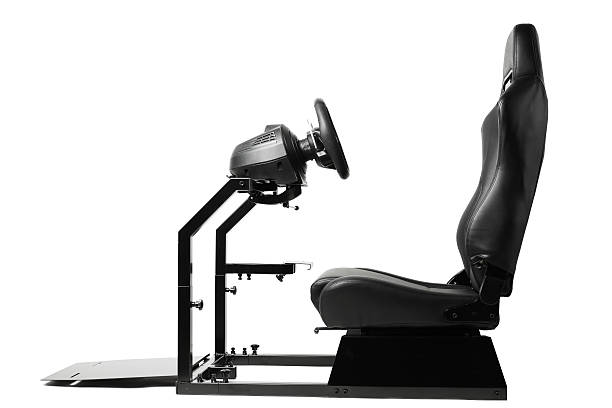 racing simulator cockpit with seat and wheel racing simulator cockpit with seat and wheel, isolated on white gaming chair photos stock pictures, royalty-free photos & images