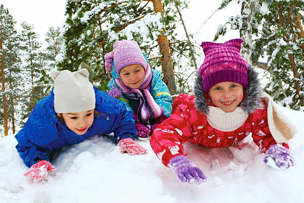 istock Winter fun, snow, children sledding at winter time 519556137