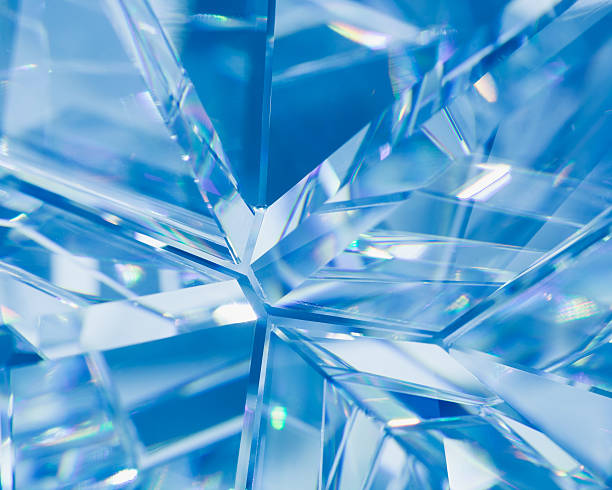 blue background of crystal refractions abstract blue background of crystal refractions facet joint photos stock pictures, royalty-free photos & images