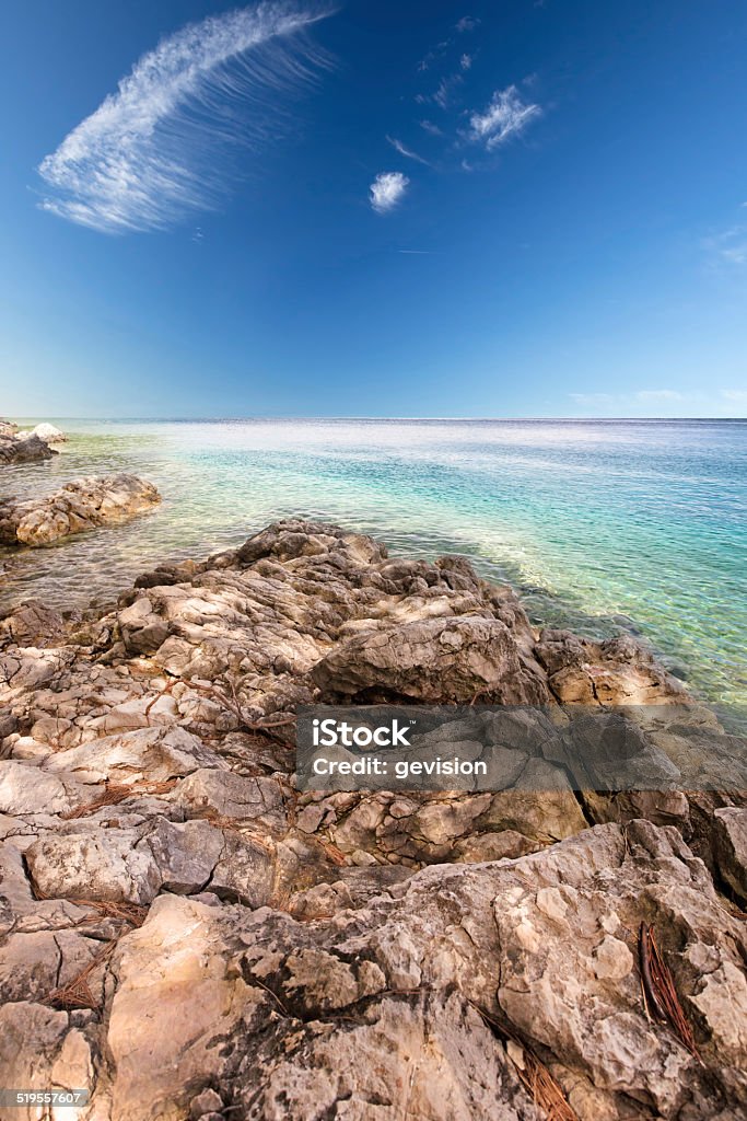 Rocky beach scenery with clear blue sky in Croatia Rocky beach scenery with clear blue sky and Adriatic sea, Croatia, Europe Balkans Stock Photo