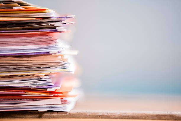istock Large stack of files, paperwork. Close-up. Desk, office. Nobody. 519557623