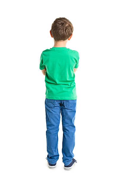 istock back of 7 years old boy full body 519558007