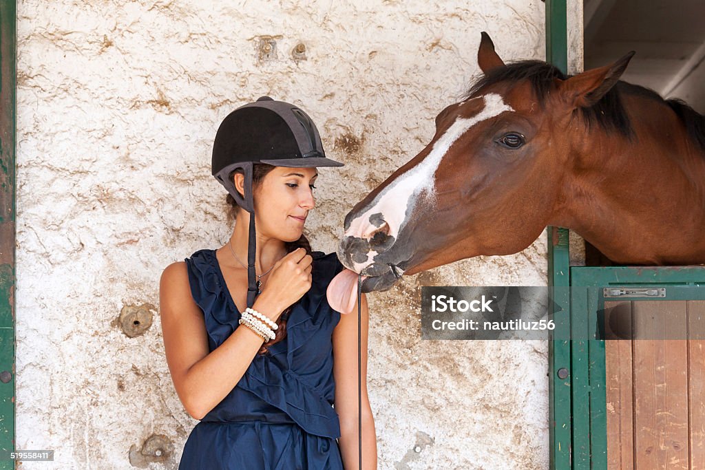 horsewoman with his horses Activity Stock Photo