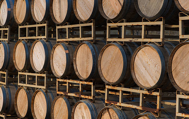 istock Row of wine barrels on stand 519558948