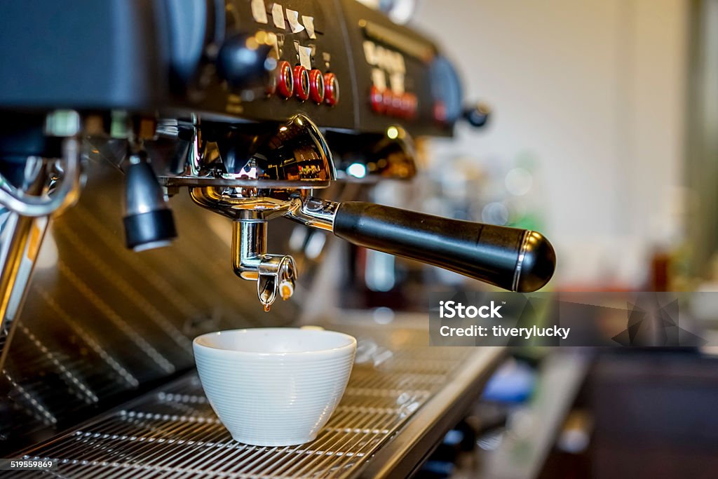 Coffee machine closeup making coffee in coffee machine at coffee shop Barista Stock Photo