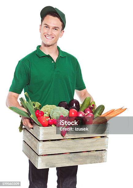 Delivery Man With Organic Food Stock Photo - Download Image Now - Supermarket, Occupation, Cut Out
