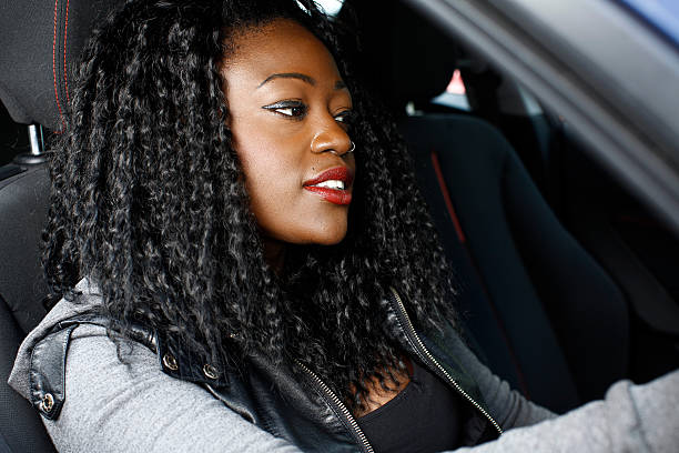 istock Cool Young Black Woman Inside Car 519560501