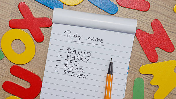 Choosing baby name for a boy stock photo