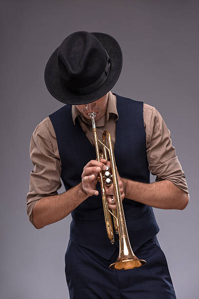 istock Handsome young jazz man 519562351