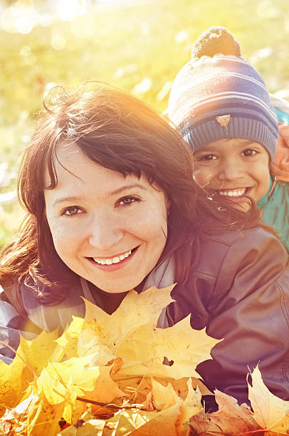 Mother and son in nature stock photo