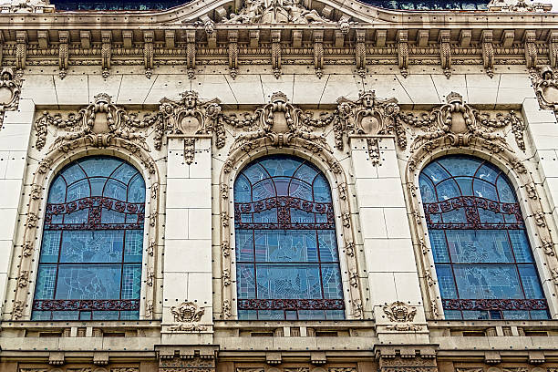 istock Facade on classical building with ornaments and sculptures 519573217