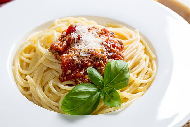 istock Spaghetti with Bolognese Sauce Parmesan and basil 519574051
