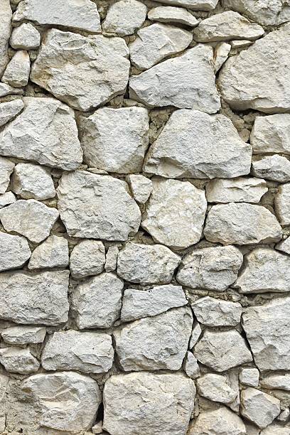 biały kamień ściana z losowo sąsiadująco wzór - cornerstone sign built structure granite zdjęcia i obrazy z banku zdjęć