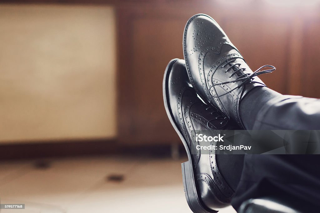 Gentleman Fashion And Lifestyle Gentleman fashion and lifestyle. Pair of men's luxury leather shoes. Black Color Stock Photo