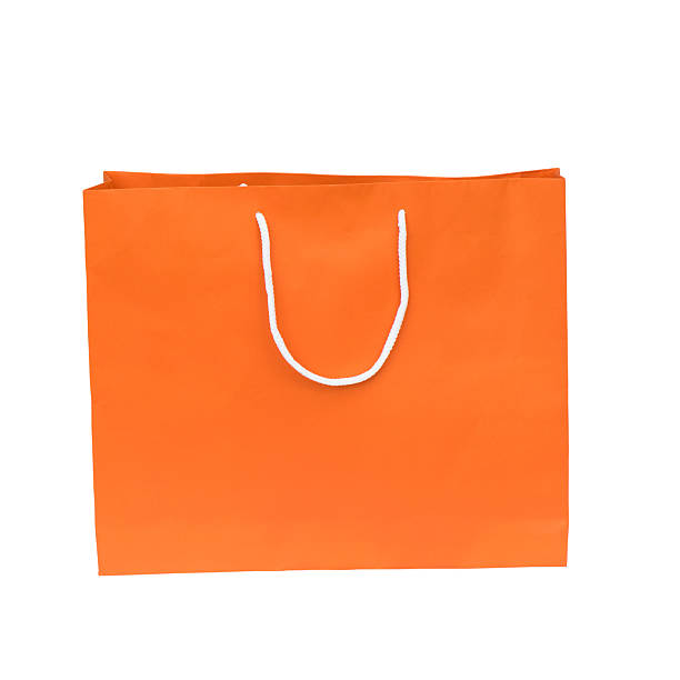 istock Orange shopping bag isolated 519577855