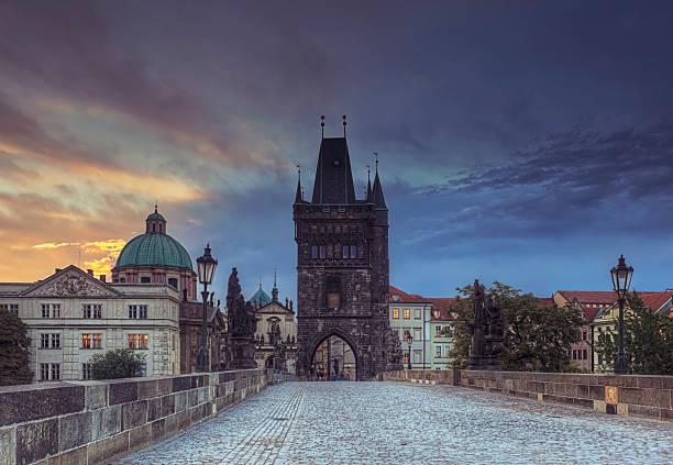 istock Charles bridge in Prague during sunrise 519577894