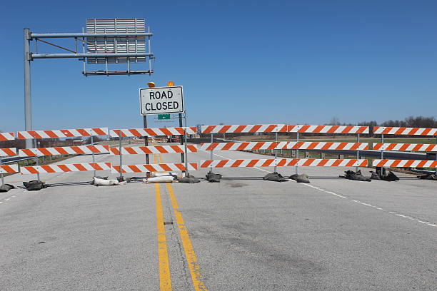 istock Signs for Road Closed over bridge 519578128