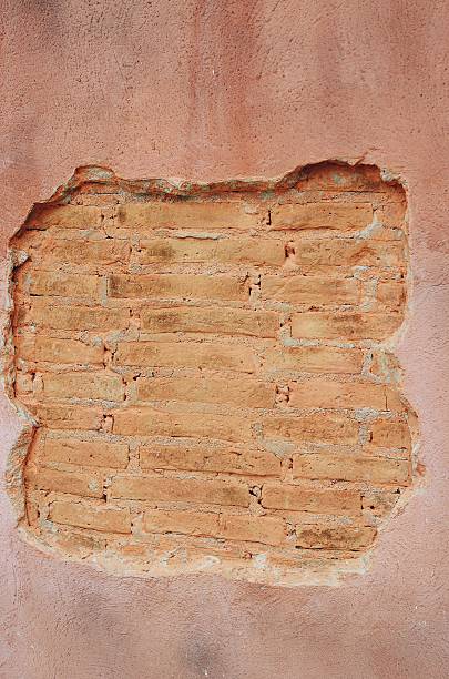 istock old rough wall made of brick and cement 519579456