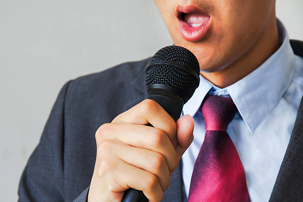 istock Young man feeling awkward getting asked by a journalist 519579726