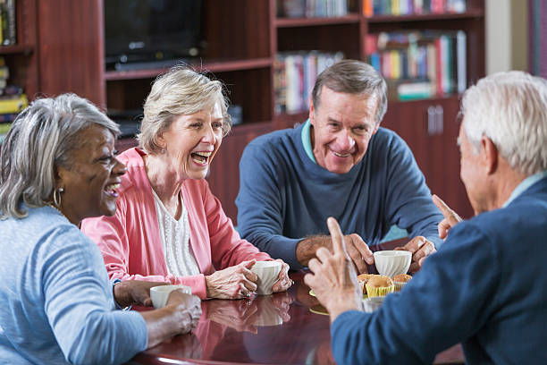 istock Multiracial group of seniors talking over coffee 519580610