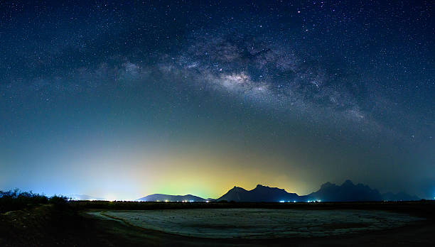 istock Milky way galaxy over mountain 519581110