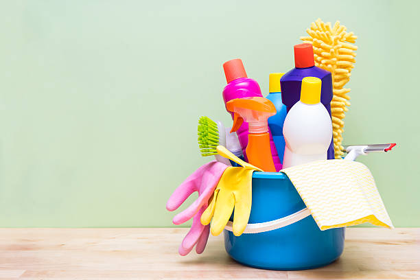 House cleaning product on wood table with green background House cleaning product on wood table with green background toilet brush photos stock pictures, royalty-free photos & images