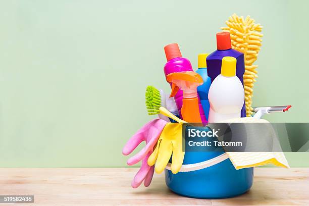 House Cleaning Product On Wood Table With Green Background Stock Photo - Download Image Now