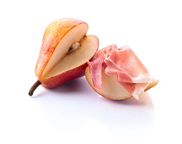 Spanish jamon with pear isolated on white background