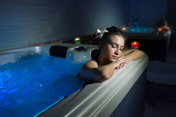 istock Relaxing in hot tub 519586990