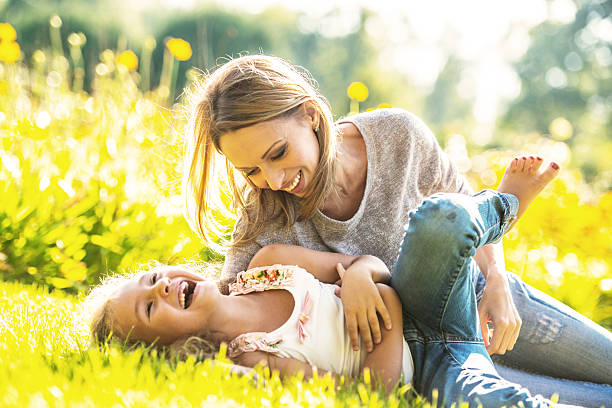 istock Mother and daughter having fun outdoors 519587103