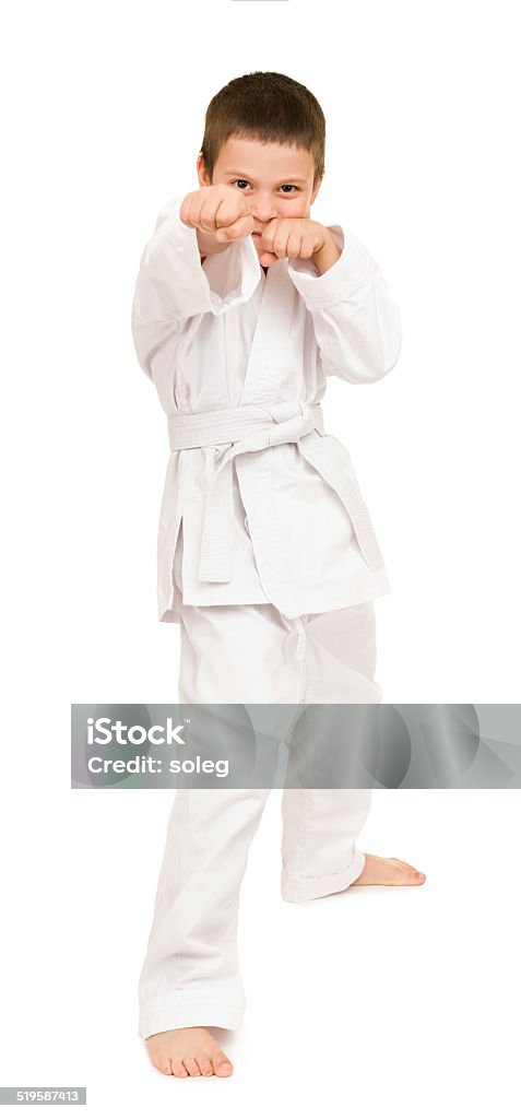 boy in white kimono boy in white kimono for martial arts posing Aikido Stock Photo