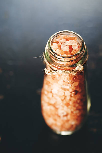 Pink Salt Crystals in a Glass