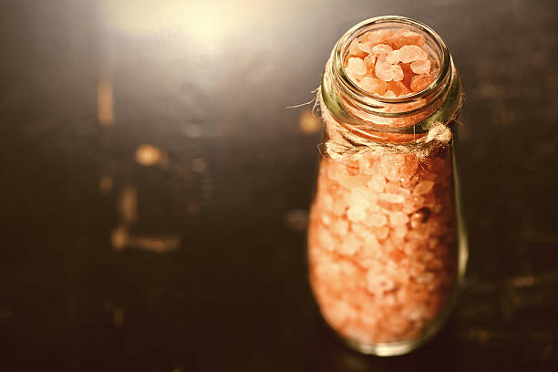 Pink Salt Crystals in a Glass