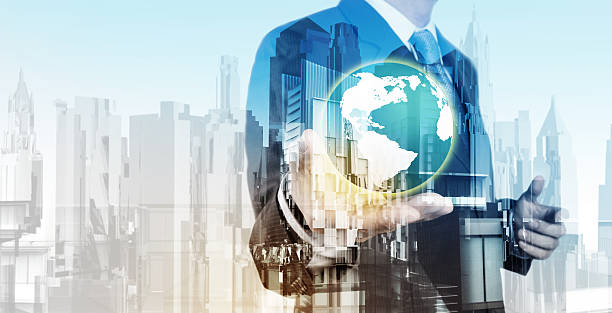 istock Double exposure of business engineer holding the earth 519587773