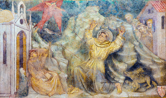 Stigmata of St. Francis of Assisi - This fresco is located in the Church of St. Francis in the town of Gualdo Tadino (Perugia, Italy). The entrance to the church is free and taking photos is allowed. The fresco was painted in 1424 by members of the workshop of Ottaviano Nelli (Italian painter of the early Quattrocento).
