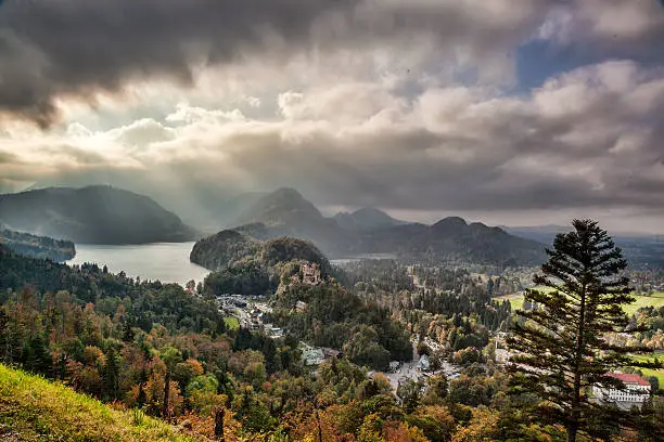 Schwangau lake with golden sunset in Bavaria Alps, Germany