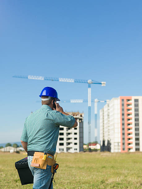istock back view of male engineer talking on phone 519590751