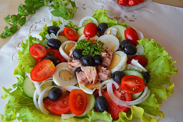 istock Vegetable mixed tuna salad on the white bowl 519592913