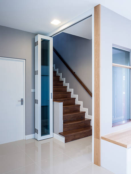 istock Wooden staircase with folding doors 519593557