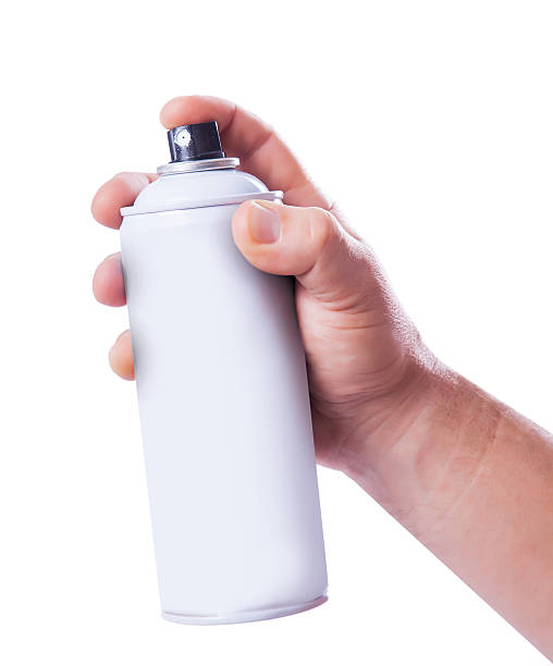 istock aerosol spray paint in his hand 519593759