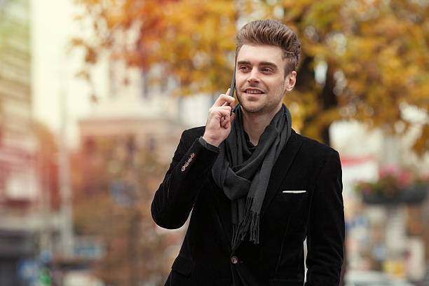 istock modern man talking on the phone in an urban environment 519594273